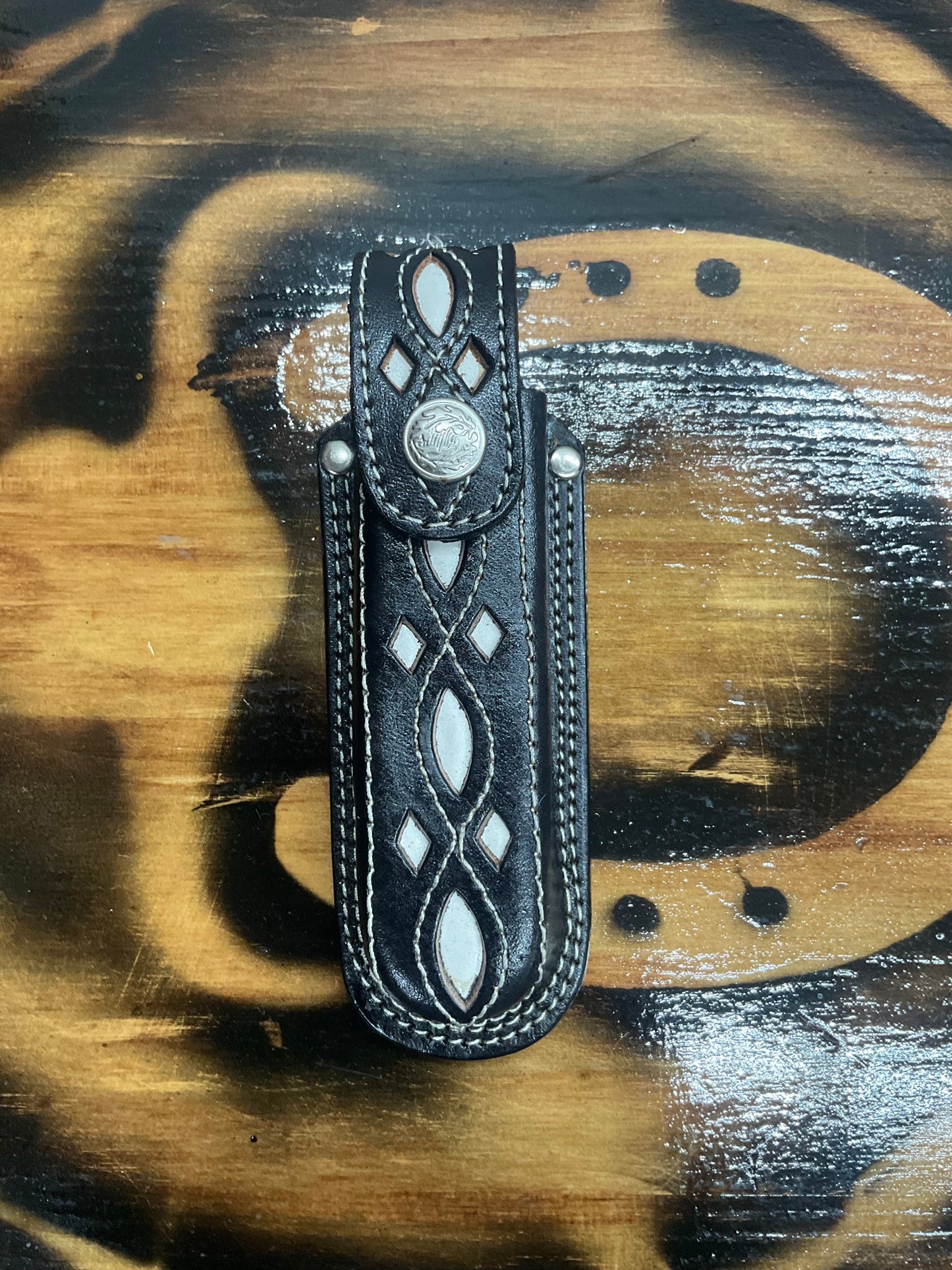 Funda para navaja pelo de vaca y print tabaco y negra