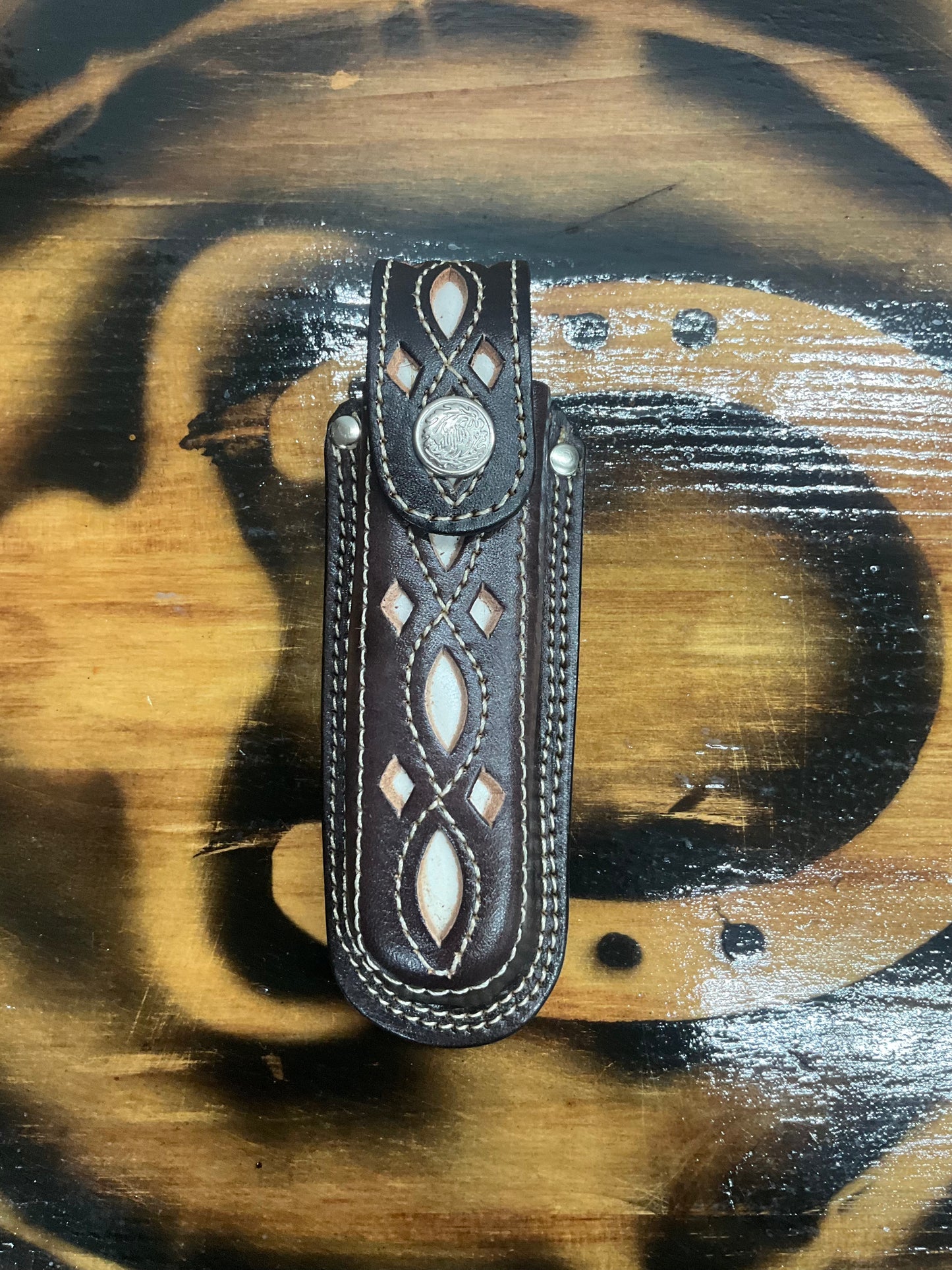 Funda para navaja pelo de vaca y print tabaco y negra